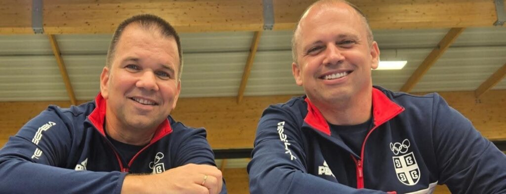 A close-up of Serbian shooting coach Goran Mikec (left) and his brother, pistol shooter Damir Mikec (right).